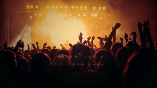A scene at dusk at a music festival