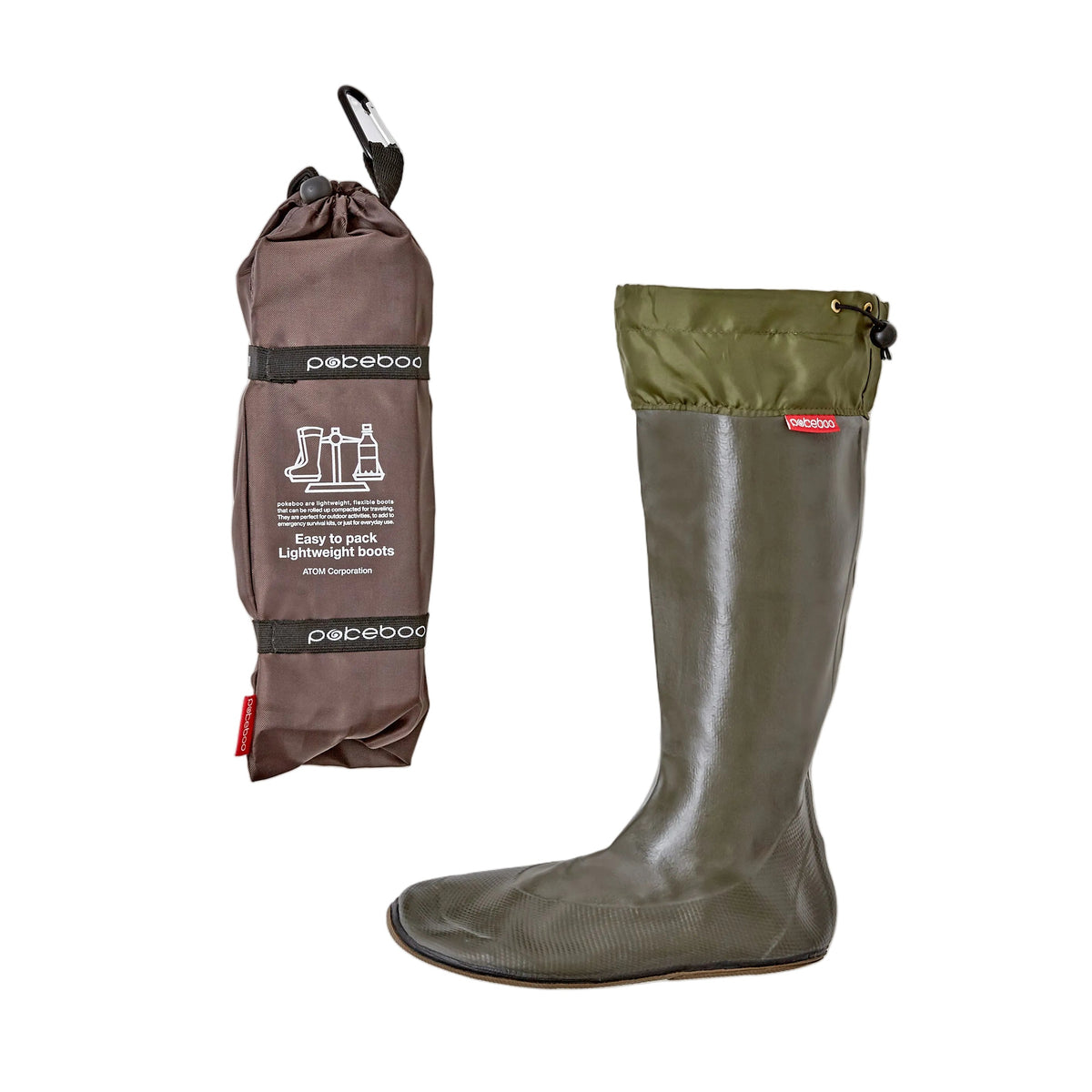 A dark olive green/charcoal waterproof boot shown next to its brown drawstring carrying pouch with a black logo, set against a plain light white background.