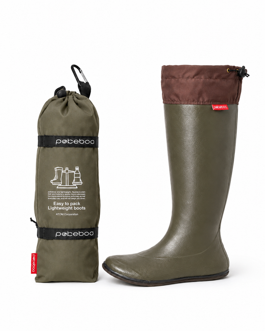 Khaki Green Original Pokeboo welly boot with brown top and matching storage bag on a white background