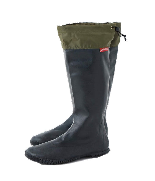 Pair of black rubber boots with green lining cuff on a white background