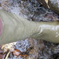 A video of khaki Pokeboo in some water and a running stream